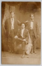 RPPC Three Young Men Seated Fur Rug Studio Photo Postcard U28 - £7.43 GBP