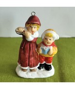 Mini Christmas Village Accessory/Ornament Lady and Child Caroling Porcel... - $6.92