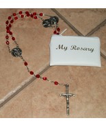 rosary new in carry case - $17.87