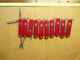 Lot of 10 Classic SD Victorinox Swiss Army knives. No Ads, red or black unused - £35.86 GBP