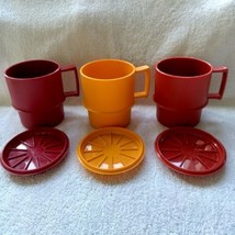 Tupperware cups with lids or coasters, harvest colors three complete sets - $22.00