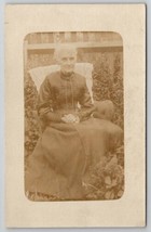 RPPC Lovely Old Woman Pretty Dress Seated Chair Yard Postcard A22 - £6.69 GBP