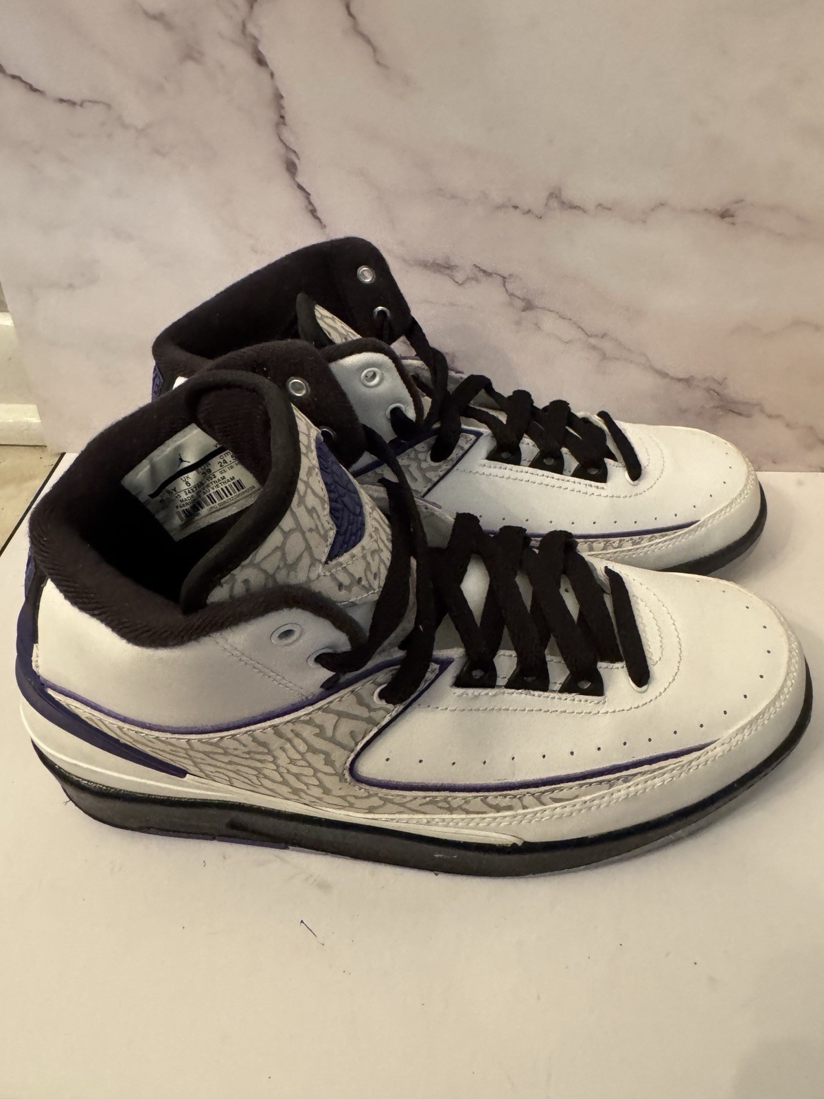 Air Jordan White And Purple 6.5  - $79.20