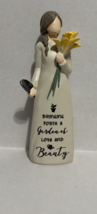 Gardening Girl Holding Flowers and a Trowel  - $399.76 MXN
