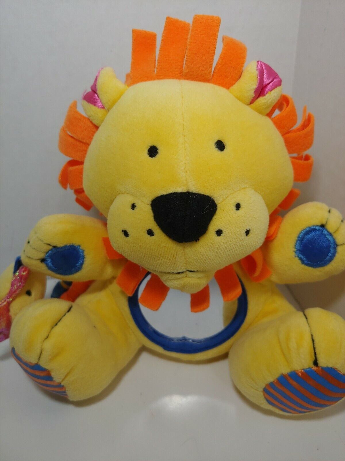 Kids II plush lion sun rattle mirror teething rings baby toy yellow blue orange  - $10.39