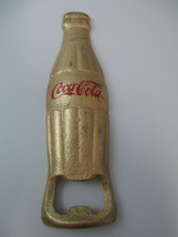 Coca-Cola Bottle Opener Gold Tone Cast Iron Bottle Shaped Script Logo - £4.77 GBP