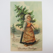 Christmas Postcard Dutch Girl Hat Apron Carries Tree in Snow Embossed Antique - £7.82 GBP