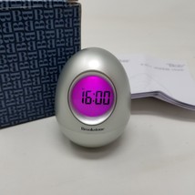 Brookstone “Bob” Silver Oval Egg Wobble Clock 5-in-1 Alarm Date Timer Temp Clock - $19.75