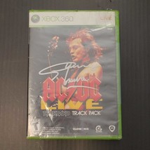 AC/DC signed game Rockband  Track Pack Xbox 360 - Angus Young - sealed - $2,784.81 MXN
