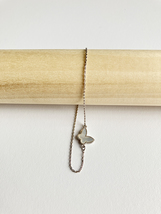 Mini Mother of Pearl Butterfly Adjustable Bracelet in Silver - £27.82 GBP