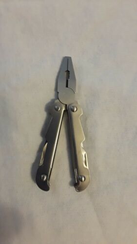 Survival Tool - Foldable With Multiple Gadgets In It&#39;s Own Holder That F... - $4.25
