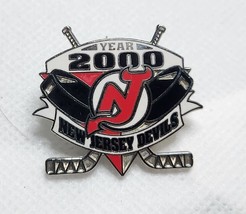 Year 2000 New Jersey Devils NHL Double Hockey Stick & Pucks Hat Lapel Pin - $11.65