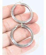 Sterling Silver HAN 1.25” Hoop Earrings  - €39,77 EUR