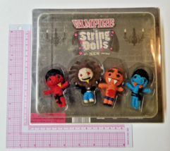 Vintage Vending Display Board Vampire String Dolls 0321 - £31.69 GBP