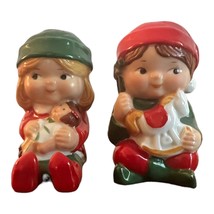 Vintage Avon Christmas Salt and Pepper Shakers Boy and Girl 1983, No Stoppers - $4.94