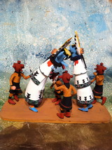 Miniature Mudhead and Shalako Kachina dolls in a Dance - $125.00