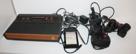 Original VTG Atari 2600 Game Console System with Controllers Paddles Wood Grain - $79.08