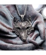 Wolf Head Pendant with Celtic Knot Details and Blue Eyes - $422.44 MXN