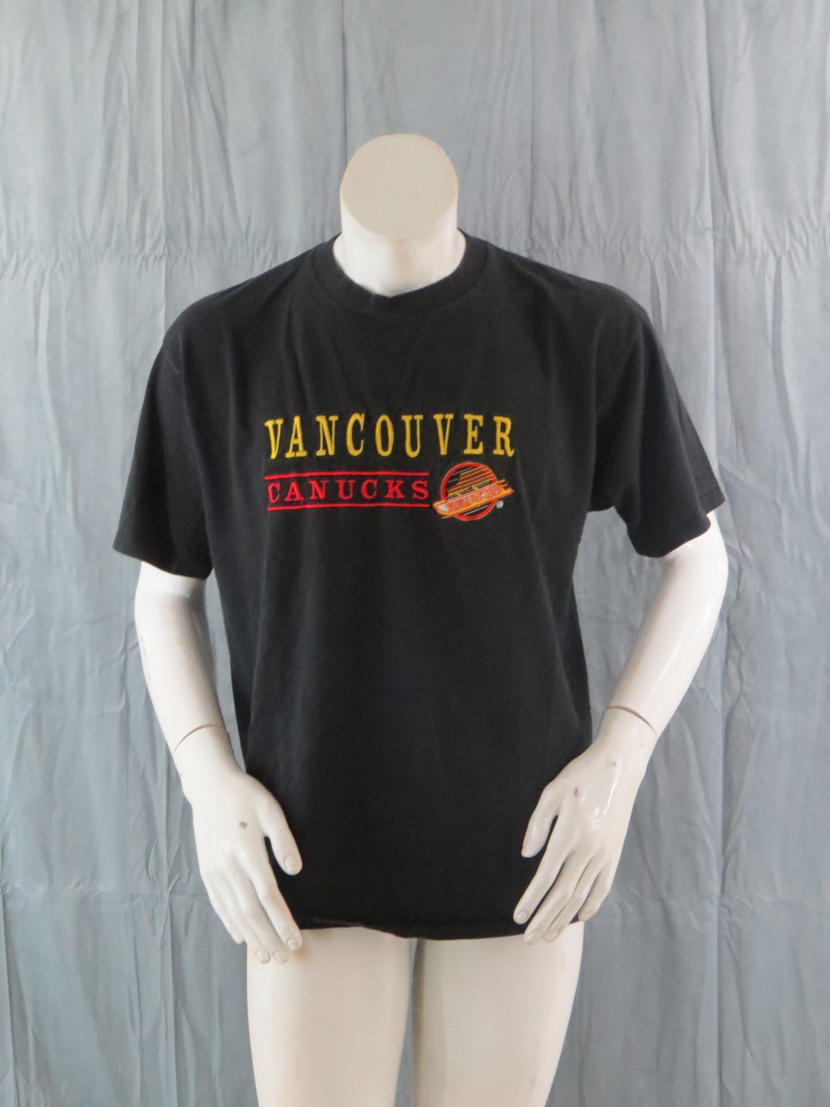 Primary image for Vancouver Canucks Shirt (VTG) - Stitched Speeding Skate Graphic - Men's XL