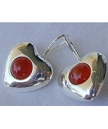 Reddish hearts earrings - $571.18 MXN