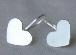 Mini silver hearts earrings - $10.00