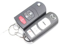 10-13 MAZDA 3 KEY FOB REMOTES PAIR E4757 image 2