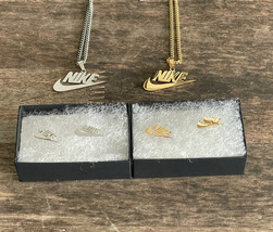 NEW NIKE SILVER AND GOLD EARRING AND NECKLACE GIFT SET CHAIN EARRINGS BU... - $906.82 MXN