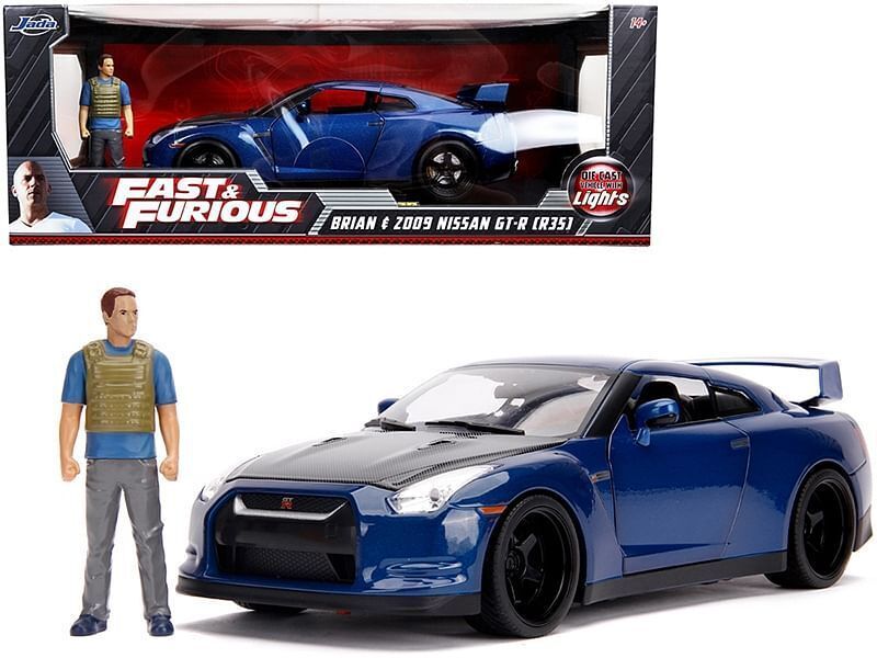 2009 Nissan GT-R (R35) Blue Metallic and Carbon with Lights and Brian Figurine - $90.47
