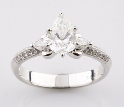 Authenticity Guarantee 
1.36 carat Pear Shape Diamond 18k White Gold Eng... - $8,781.70