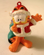Garfield Christmas Ornament with gift sack draped over back, made by Heirloom - £10.67 GBP