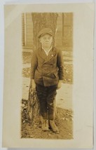 C1915 Young Boy Newsboy Cap Posing at Tree for Photo Rppc Postcard R3 - £7.82 GBP