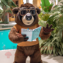 Brown Sloth Bear mascot costume character dressed with a Rash Guard and Reading  - $1,289.00