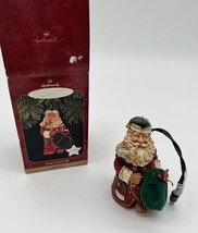 Hallmark Keepsake Ornament Santa&#39;s Secret Gift 1997 Hallmark Christmas O... - $9.49