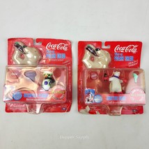 1998 Coca-Cola Wind-Up Polar Crew Skating Bear &amp;  Backpack Penguin  - $13.85