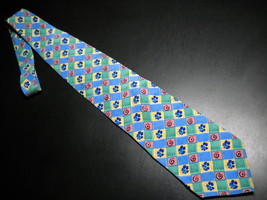 An item in the Fashion category: J Garcia Neck Tie Collection 09 Snail Garden Stonehenge Blues and Yellows