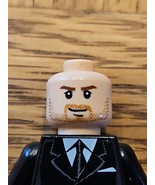 LEGO Indiana Jones Minifigure Head Light Flesh Closed Mouth Grin - $365.45 MXN