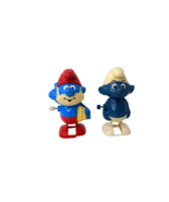 Lot of 2 Vintage Smurf Wind-Up Toys 1980 Smurf &amp; 1982 Papa Smurf - $22.92 CAD
