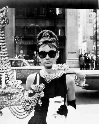 Audrey Hepburn in Dior sunglasses looks in window Breakfast at 24x36 POSTER