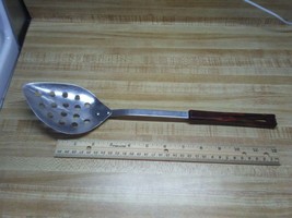 Vintage stainless steel slotted serving spoon - $18.99
