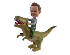 Custom Bobblehead Valiant kid riding a ferocious dinosaur and having fun - Paren - £132.94 GBP