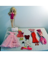 Fair Skinned Barbie, Blonde Hair, Blue Eyes, Plastic Body w/Outfits - $279.63 MXN