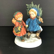 Vintage 1981 Avon Sharing Christmas Spirit Porcelain Figurine Cut Tree - $34.99