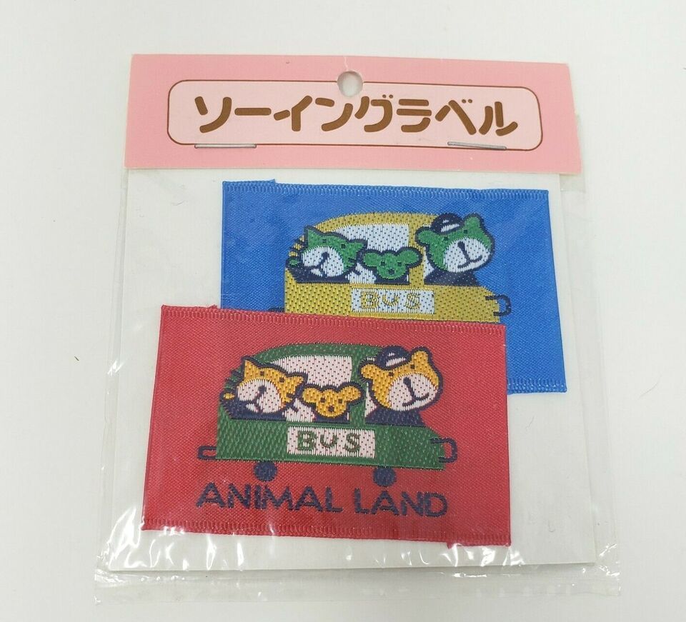 2 VINTAGE 1977 SANRIO COTTON FLOWER ANIMAL LAND BEAR IN BUS SEWING PATCH / LABEL - $28.50