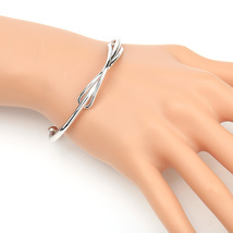 Silver Tone Bangle Bracelet With Contemporary Infinity Design - £18.97 GBP