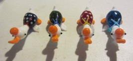 Miniature art glass duck figurines x 4 - $21.52