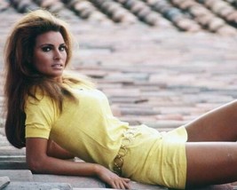 Raquel Welch wears classic 1960&#39;s yellow mini dress leggy pose 12x18 inch Poster - £15.97 GBP