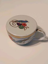 Tea cup shape tin 1997 metal w/gold trim blue bird with floral design Y2k - $16.30 CAD
