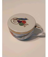 Tea cup shape tin 1997 metal w/gold trim blue bird with floral design Y2k - $16.33 CAD