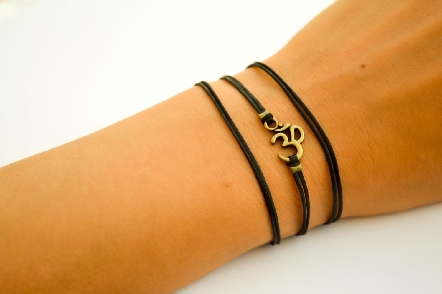 OM bracelet, wrapped bracelet with bronze tone Om charm, Hindu symbol, black, gi - $13.00