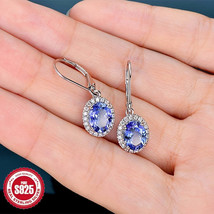 925 sterling silver oval shaped new charm earrings with blue gemstone side pend - $32.89